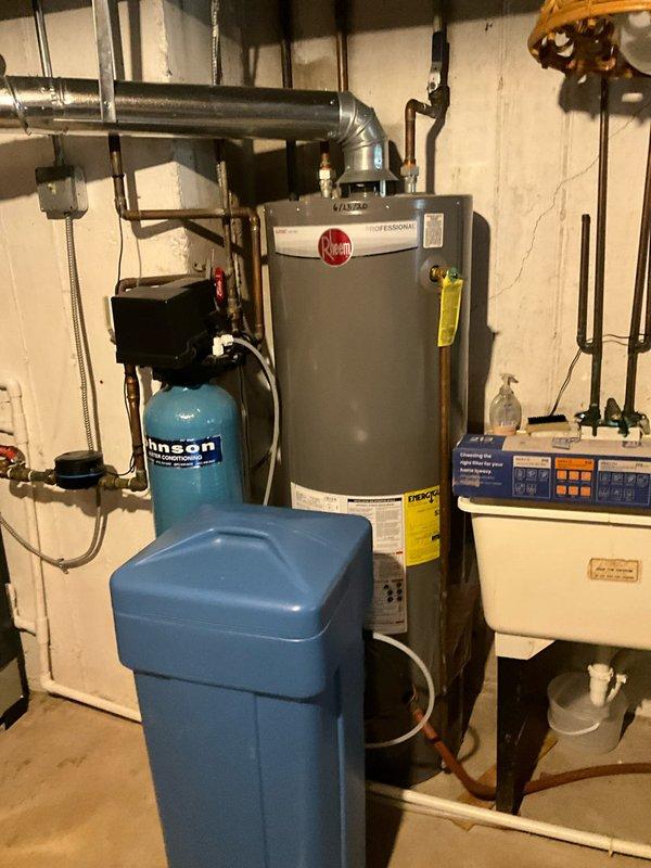 Completed comprehensive BFMA tune-up service on residential HVAC system with equipment over one year old. Performed standard air conditioning maintenance procedures, inspected basement mechanical systems including water heater and associated ductwork, and replaced air filter with new pleated unit to ensure optimal system performance and air quality.