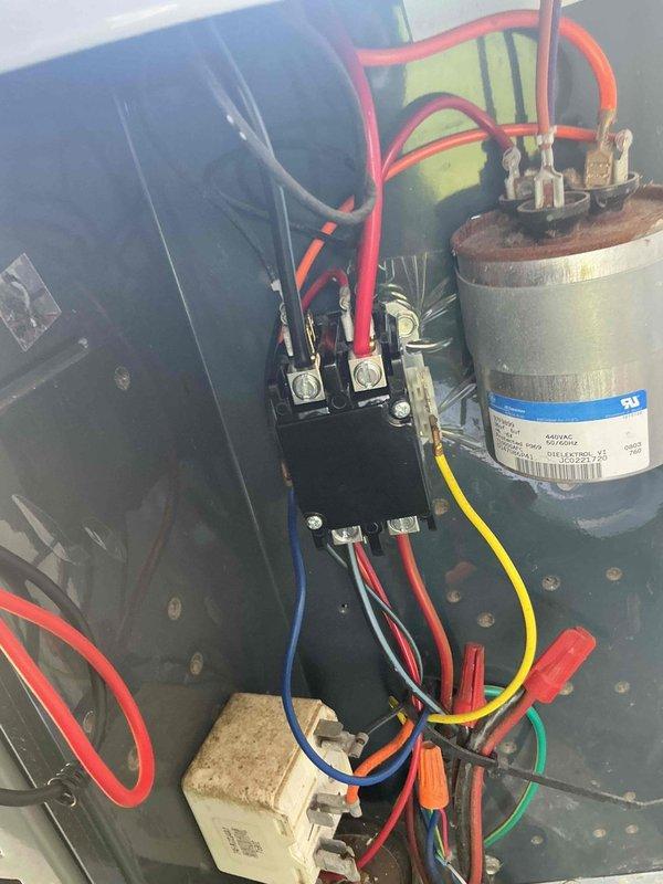 Responded to no cooling call where thermostat indicated cooling mode but system was not producing cold air. Upon inspection of electrical control panel, diagnosed failed capacitor preventing compressor operation. Replaced defective capacitor, verified proper electrical connections at contactor and all wire terminals, tested system operation, and confirmed unit now cooling properly with all components functioning within normal parameters.