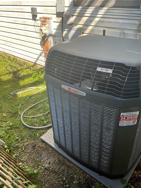 Completed comprehensive BFMA tune-up on residential XL16i air conditioning system. Performed standard preventive maintenance procedures including inspection of condenser unit, verification of electrical connections at disconnect box, assessment of unit operation, and visual inspection of exterior components. Unit found in operational condition with normal weathering; condenser coils and exterior surfaces showed typical dirt accumulation for outdoor installation.