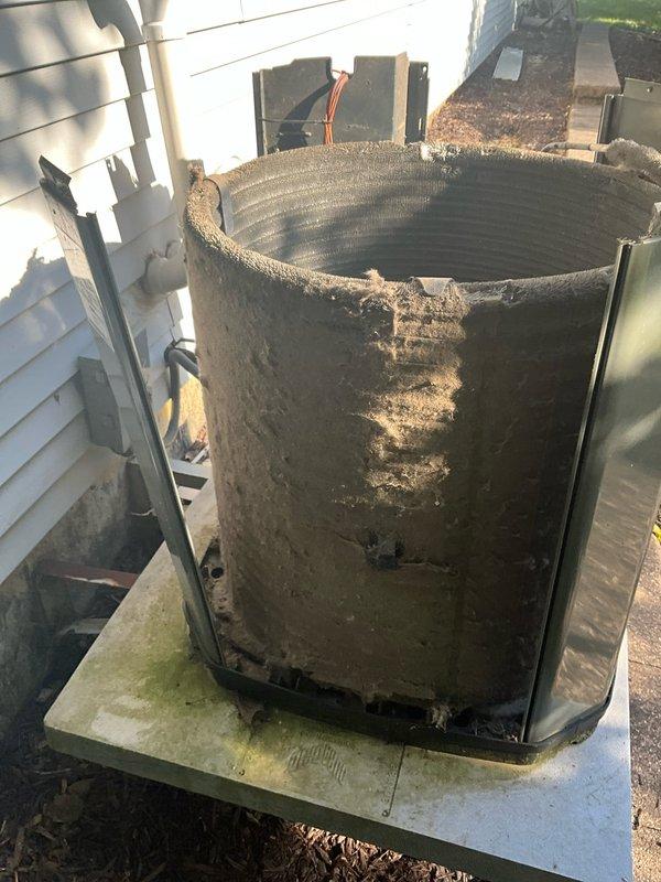 Completed comprehensive BFMA tune-up service on two outdoor HVAC units, both 9-11+ years old, during afternoon appointment window. Upon arrival, discovered both units in severely deteriorated condition with extensive exterior corrosion, rust damage, and compromised structural integrity. First unit exhibited heavy dark staining, possible mold/mildew accumulation, and significant casing discoloration with warped panels. Second unit showed advanced deterioration with large sections of metal housing completely rusted through, jagged edges along top rim, and exposed internal coil structure visible through damaged casing. 

Performed standard tune-up procedures on both systems including inspection of condenser coils (found heavily soiled with accumulated debris), verification of refrigerant levels, electrical connections testing, and condensate drain line evaluation. Documented extensive damage through photographic evidence for customer review. Advised customer of critical safety concerns an