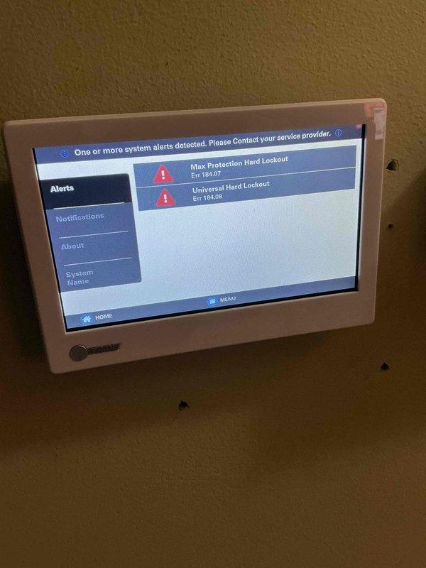 Responded to residential no cooling call. Upon arrival, found HVAC system displaying multiple hard lockout errors on thermostat interface, including Max Protection Hard Lockout Error 18407 and Universal Hard Lockout Error 18108. Inspected relay panel and dual fuel control board for fault diagnosis. Documented system alerts and control board configuration with photos for troubleshooting and repair recommendations.