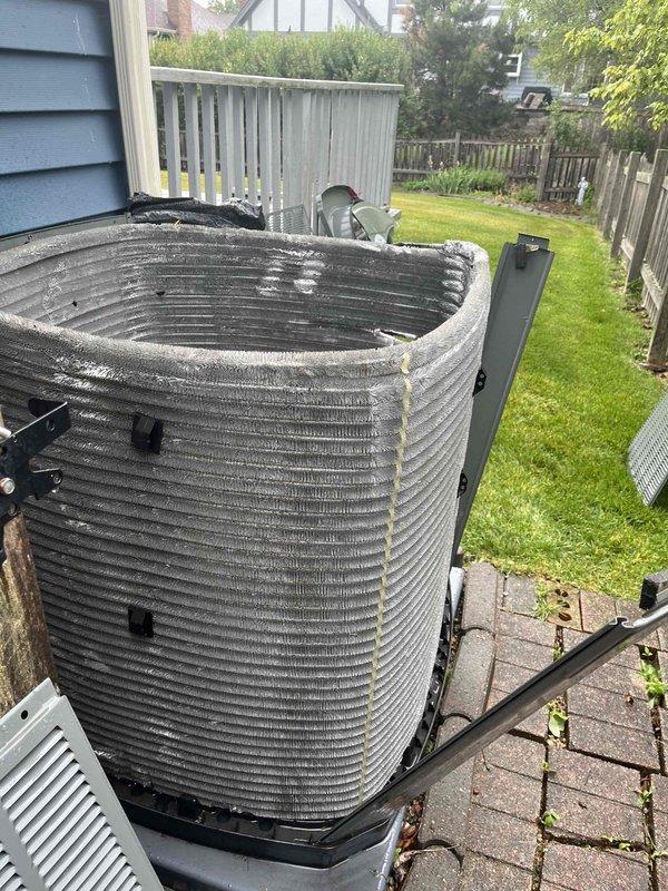 Completed comprehensive BFMA tune-up service on residential HVAC system with equipment aged 4+ years. Performed preventive maintenance on indoor air handler unit located in basement, including filter inspection which revealed moderate dust and debris accumulation on pleated filtration media. Serviced outdoor condensing unit positioned on paver patio beside residence, inspecting heat exchanger coil fins and verifying proper operation of compressor and fan motor. All system components tested and operating within normal parameters upon completion of tune-up procedures.