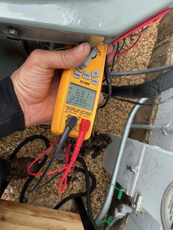 Completed comprehensive BFMA tune-up on 4-year-old air conditioning system, including full system diagnostics and performance verification. Measured electrical parameters using digital multimeter, confirming proper voltage and amperage readings at 229.9V, and verified thermostat operation showing system cooling to 72°F setpoint with indoor humidity at 49%. Performed air cleaner semi-annual filter change service and established recurring maintenance schedule for continued system reliability.
