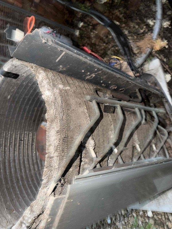Responded to service call for insufficient cooling with indoor temperature reading 78°F while thermostat set to 74°F. Upon inspection, found outdoor condenser unit with severely restricted airflow due to excessive dirt, dust, and debris accumulation on condenser coils. The heavy buildup was obstructing heat transfer capacity and causing reduced system efficiency. Performed thorough coil cleaning to remove contamination and restore proper airflow through cooling fins. Verified system operation after cleaning, confirming improved performance and cooling capacity restored to manufacturer specifications.