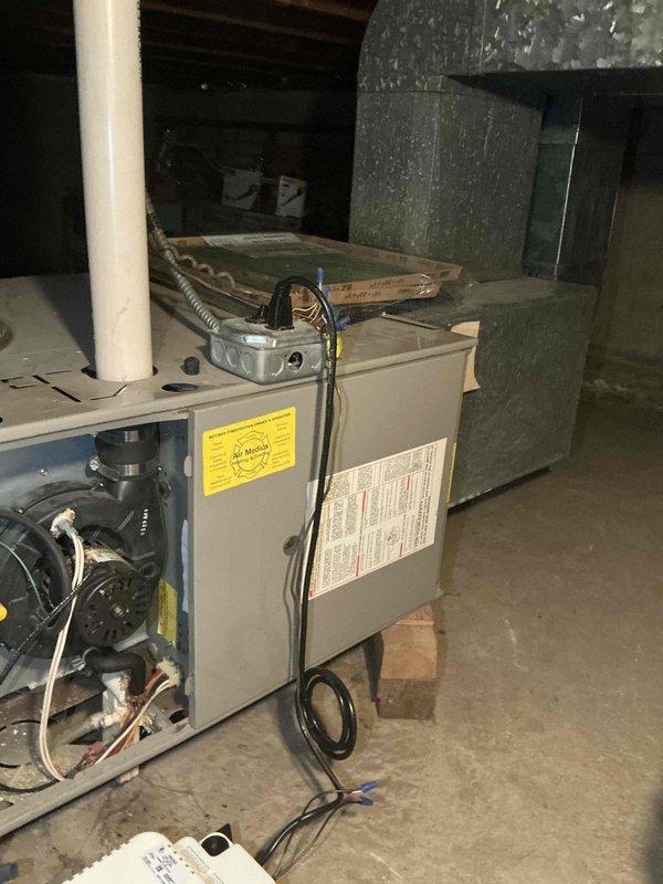 Responded to service call for 15+ year old air conditioning system failure that occurred over the weekend. Upon inspection, evaluated existing HVAC system including furnace and evaporator coil configuration in basement mechanical room. Provided comprehensive estimate for complete A/C system and evaporator coil replacement, offering cost-effective alternative to previous high-priced proposal from competing contractor. Documented existing equipment condition and installation specifications through detailed site photography for accurate system sizing and replacement planning.