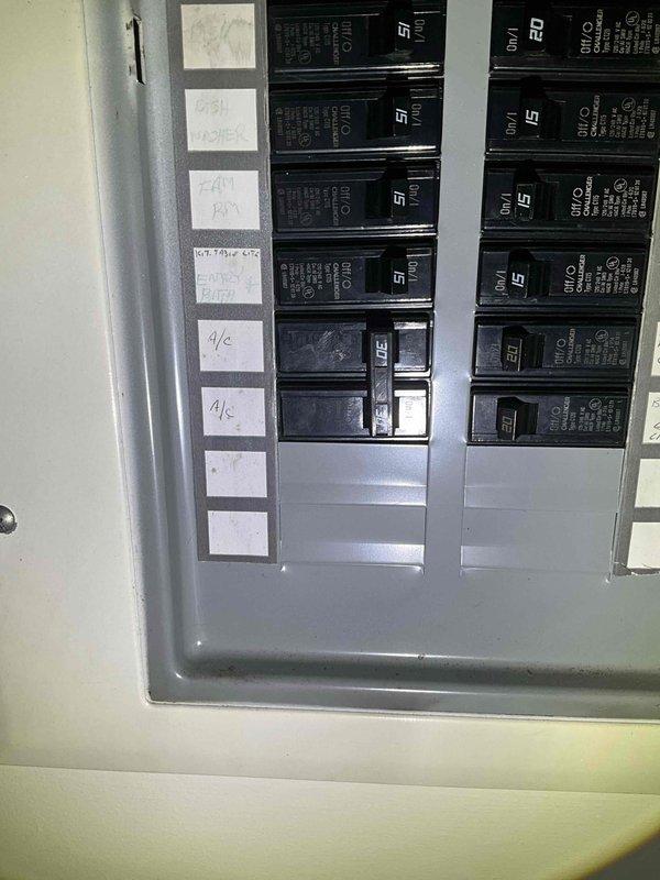 Conducted comprehensive sales estimate for air conditioning system and evaporator coil replacement at residential property. Evaluated existing outdoor condensing unit located beneath elevated wooden deck structure and assessed electrical panel configuration to determine compatibility requirements for new equipment installation. Documented current system placement, electrical infrastructure including circuit breaker panel with multiple circuits, and site-specific installation considerations including deck clearance, landscaping proximity, and access constraints for future equipment replacement.