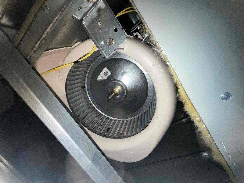 Completed comprehensive BFMA tune-up service on attic-mounted HVAC system, performing dual AC tune-up procedures and filter replacement as part of preventative maintenance contract. Inspected and serviced blower motor assembly and squirrel cage fan, verified proper electrical connections, examined ductwork connections, and confirmed all components operating within manufacturer specifications. Unit found in good working condition with no deficiencies noted during inspection.