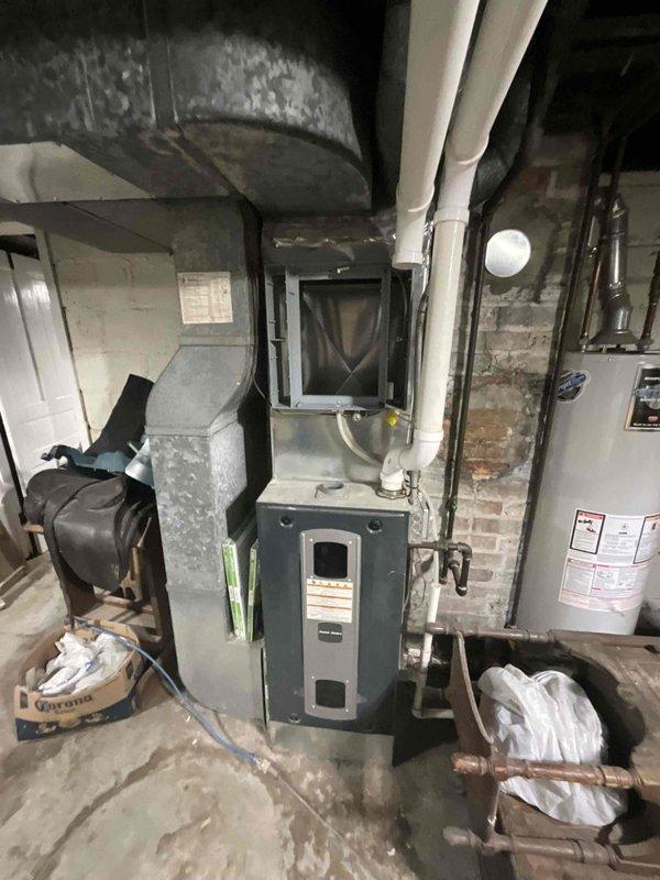 Completed full HVAC system installation including a 15 SEER single-stage air conditioning unit with matching fully insulated aluminum cased evaporator coil. Installed new refrigerant line set to connect outdoor condensing unit to indoor coil, ensuring proper refrigerant flow and system efficiency. Added electrical sub panel to main service box to provide dedicated circuit for new equipment, meeting current electrical code requirements.

Installed new programmable thermostat for system control and relocated existing powered humidifier from its original position to the return drop side of ductwork for improved performance and accessibility. All electrical connections completed and verified for proper operation. System was pressure tested, evacuated, and charged to manufacturer specifications. Conducted full system startup and performance verification, confirming proper airflow, temperature differential, and overall operation of cooling system. All components functioning as designed with 