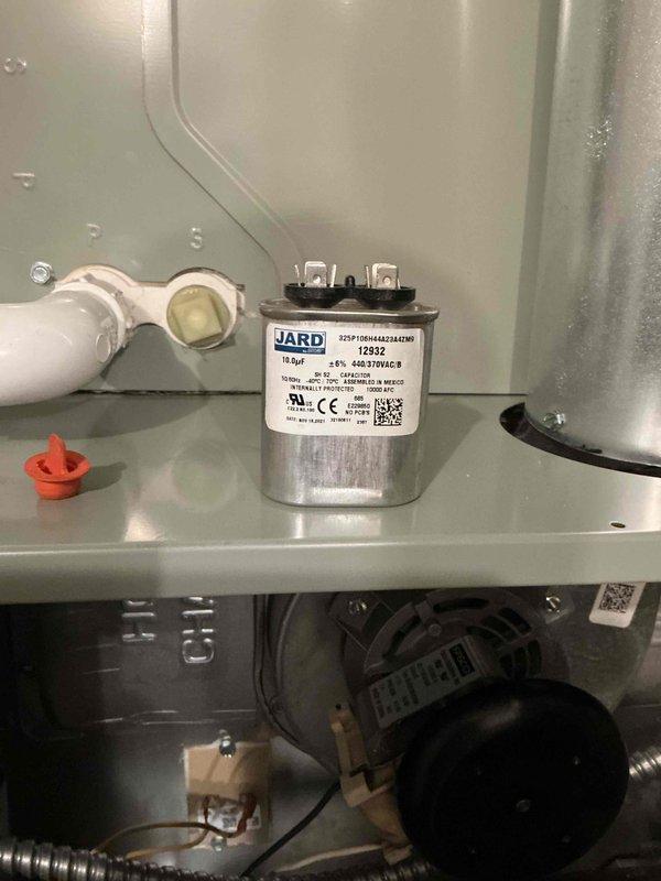Completed comprehensive BFMA tune-up on 13+ year old residential air conditioning system. Performed thorough inspection of outdoor condenser unit, verified proper operation of JARD dual-rated capacitor (15 µF, 440/370VAC), checked all electrical connections and components including condenser fan motor, and confirmed system functionality. Unit operating within normal parameters with all components in serviceable condition.