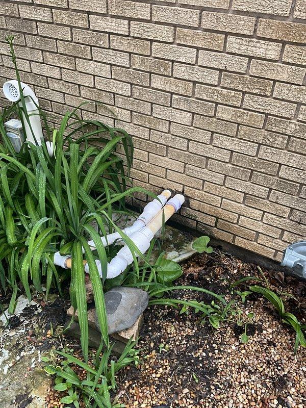 Responded to service call for non-operational sump pump with concerns about potential basement flooding. Upon inspection, diagnosed and resolved the issue to restore proper sump pump functionality. Verified discharge lines exterior to foundation were clear and properly positioned, and confirmed all mechanical room plumbing systems including water heater connections were operating correctly to prevent water backup and protect the home from flooding damage.