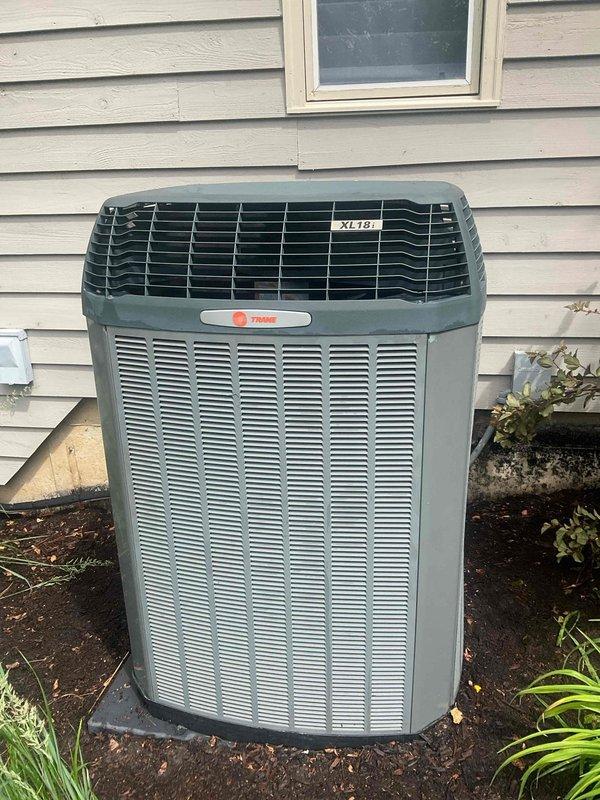 Completed comprehensive BFMA tune-up on residential Trane XL781 outdoor condensing unit. Performed full system inspection, checked refrigerant levels, cleaned condenser coils, verified electrical connections, and tested operational efficiency. Inspected and documented condition of pleated air filter showing dust accumulation; filter serviceable but recommended monitoring for future replacement to maintain optimal airflow and system performance.