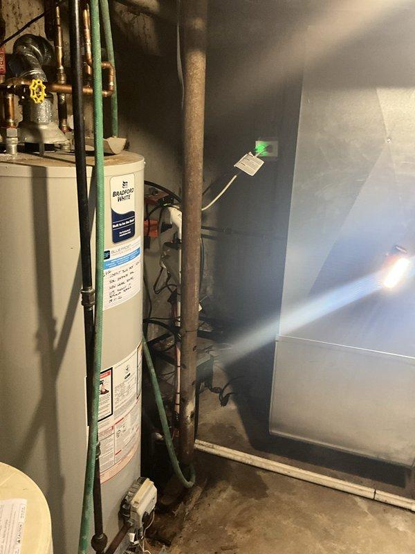 Installed new 1/2 horsepower primary sump pump in basement mechanical room. Removed redundant 1-1/2" check valve from interior discharge line after confirming presence of existing check valve on exterior discharge near air conditioning unit to prevent double-check valve configuration. New pump installation includes 3-year manufacturer warranty on equipment and 1-year labor warranty.