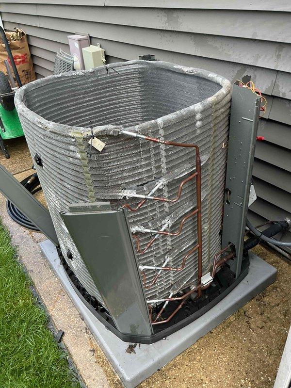 Completed comprehensive BFMA tune-up service on residential air conditioning system over 3 years old during afternoon appointment window. Performed full system inspection of outdoor condenser unit, noting accumulated debris and dirt on exterior fins requiring attention. Replaced air filter with new unit, verified proper airflow direction marking, and inspected indoor components including blower motor assembly. Cleaned condenser coils, checked refrigerant lines and electrical connections at disconnect box, and confirmed unit operational status on concrete pad foundation.