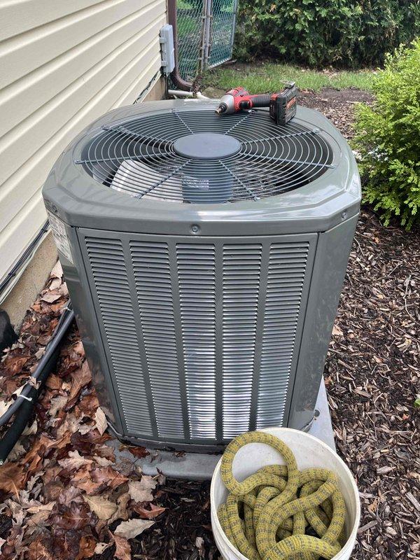 Completed comprehensive BFMA tune-up on 8+ year old residential air conditioning system. Performed thorough inspection of outdoor condenser unit and indoor evaporator coil assembly, noting heavy dirt and debris accumulation on coil fins and copper refrigerant lines showing normal oxidation. Cleaned condenser coils, checked refrigerant levels, tested electrical components, verified proper airflow through louvers, and ensured unit operational efficiency. System returned to proper working condition with improved performance following standard maintenance protocol.