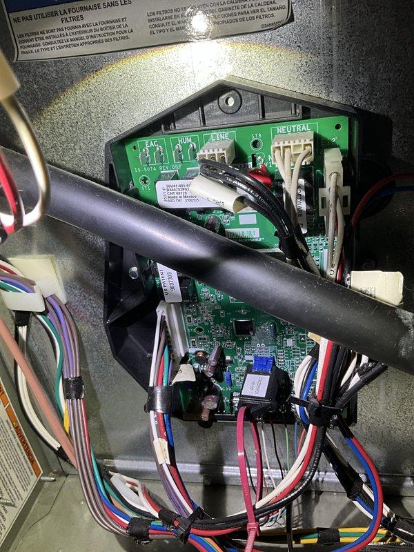 Completed BFMA AC tune-up and troubleshooting service. Replaced malfunctioning XL1050 thermostat that was displaying conflicting cooling, idle, and heating icons simultaneously. Performed comprehensive system inspection including control board verification, electrical connections check, and air filter assessment. All system components tested and operating within manufacturer specifications following thermostat replacement.