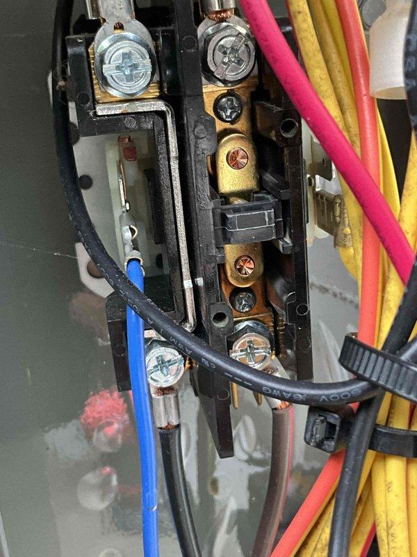 Responded to residential no cooling call where outdoor condensing unit was not operating despite thermostat calling for cooling with indoor temperature at 82°F and setpoint at 70°F. Performed electrical diagnostics using digital clamp meter at condensing unit to check voltage and amperage at compressor and contactor. Inspected electrical connections, terminal block, and wiring configuration including capacitor connections and control wiring. Identified and resolved electrical issue preventing compressor operation, restoring normal cooling function to system.