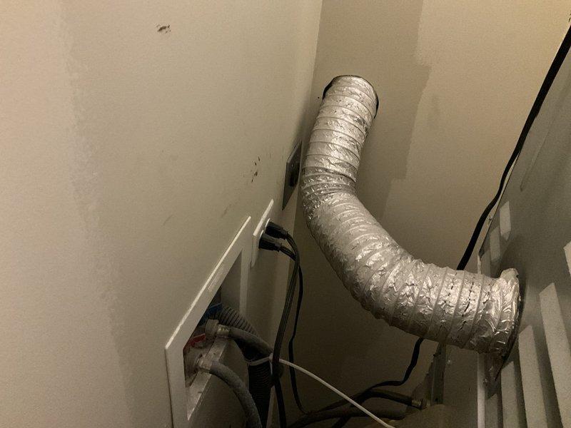 Completed dryer vent cleaning service at single-story residence with vent run measuring less than 15 feet. Accessed flexible aluminum ductwork in utility closet area, removed lint buildup and debris from entire vent system, and verified proper airflow upon completion. System inspected and returned to normal operation with improved ventilation efficiency.