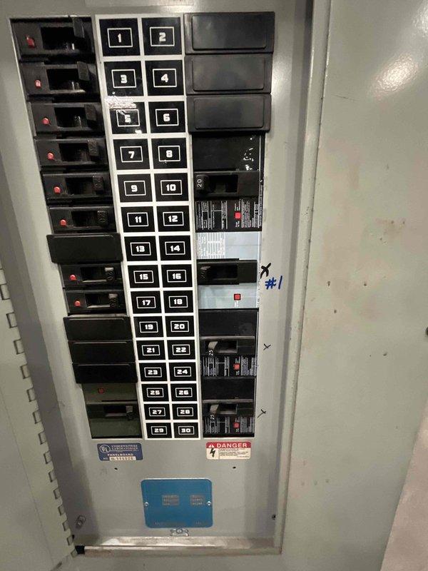 Responded to after-hours no cooling call for rooftop unit that experienced unusual noise before failure. Upon arrival, inspected RTU electrical components and control systems. Verified power supply at breaker panel and confirmed unit was receiving proper voltage. Diagnosed failed variable frequency drive (VFD) based on manufacturer label inspection showing 2022 manufacturing date and system error indicators. Replaced defective VFD unit and restored full cooling operation to commercial facility.