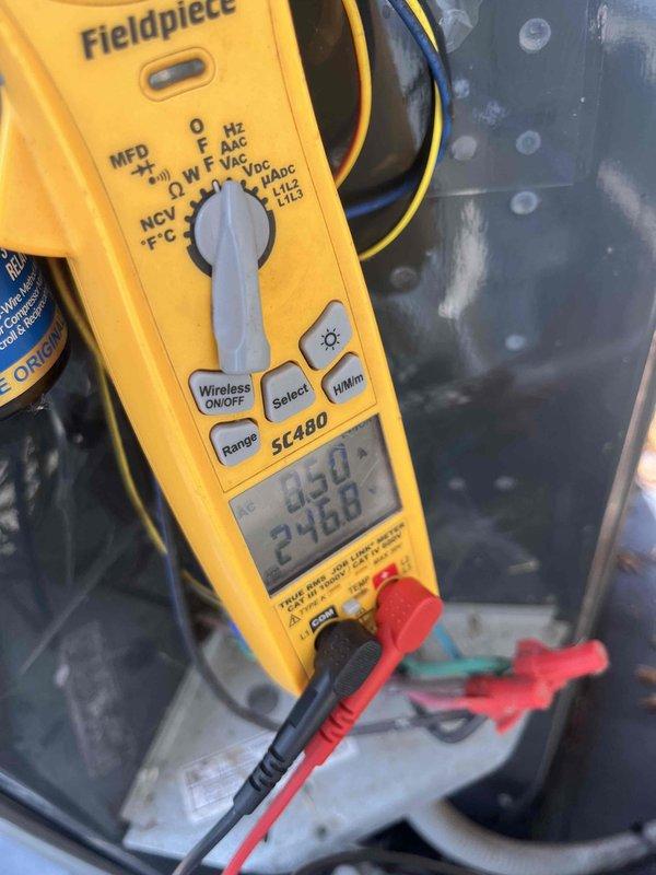 Performed comprehensive BFMA tune-up on 7-year-old air conditioning system. Conducted thorough inspection of blower assembly and internal components, verified electrical measurements including capacitance reading of 50 MFD and voltage at 24.88V using calibrated digital multimeter. All system parameters tested within manufacturer specifications and unit operating properly upon completion.