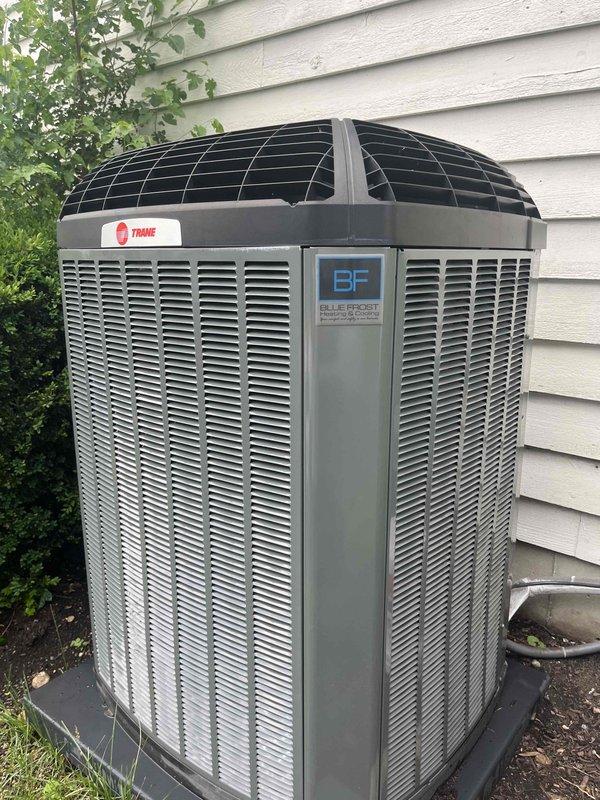 Completed comprehensive BFMA tune-up service on a 5+ year old Trane air conditioning unit during afternoon appointment window. Performed full system inspection, cleaned condenser coils which showed moderate dust and debris accumulation between fins, checked refrigerant levels and copper line connections, verified electrical connections and wiring integrity, and tested overall system operation. Unit is functioning properly with all components operating within normal parameters.