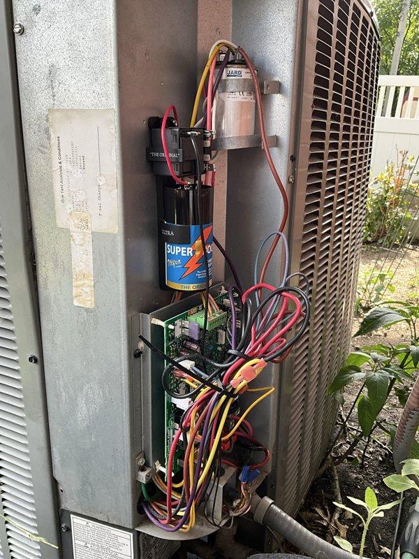 Replaced defective control board in outdoor AC unit and installed hard start kit to improve compressor performance. The new circuit board was staged at headquarters and successfully installed with all wire harnesses properly connected to terminals. Hard start kit with SUPCO capacitor was mounted and wired to assist compressor on startup, reducing electrical draw and extending equipment lifespan.