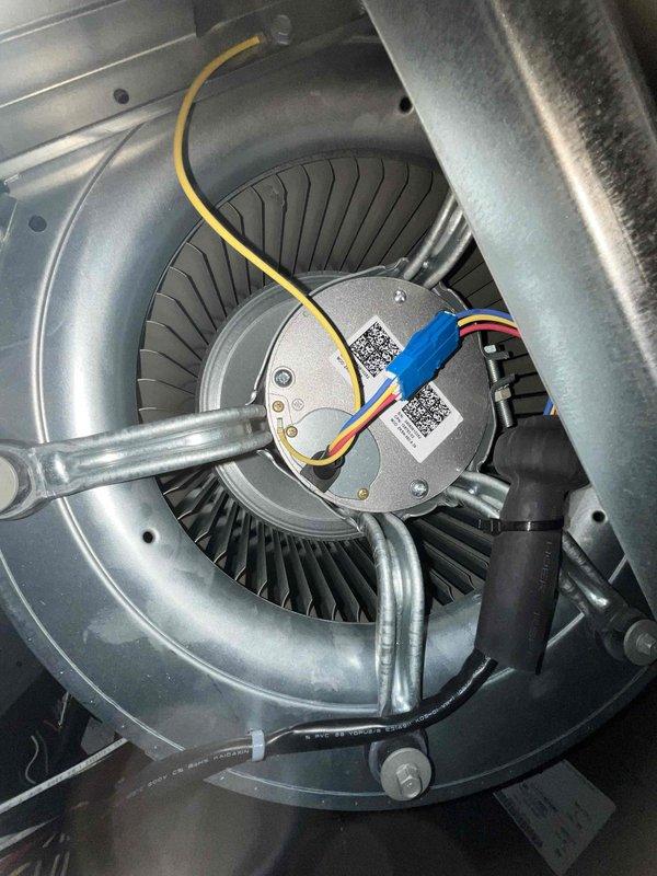 Completed comprehensive BFMA tune-up service on residential air conditioning system. Performed inspection of indoor blower motor assembly, verified proper motor operation and electrical connections, and checked squirrel cage fan for debris accumulation. Inspected outdoor condensing unit and noted significant dirt and debris buildup on condenser coil fins with visible staining throughout, cleaned coils to restore proper airflow and heat transfer efficiency. System operational upon completion with all components functioning within normal parameters.