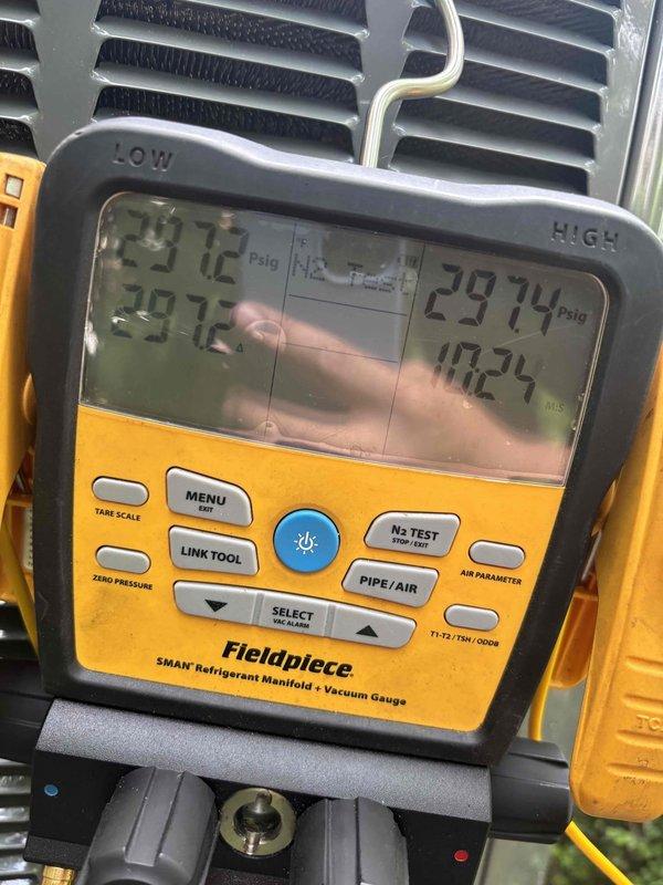 Replaced defective TXV metering device in cooling system under manufacturer's warranty and installed a Quiet Check Valve on the sump pump discharge line. System pressures were verified using calibrated manifold gauges, confirming proper refrigerant charge and operational parameters post-repair.