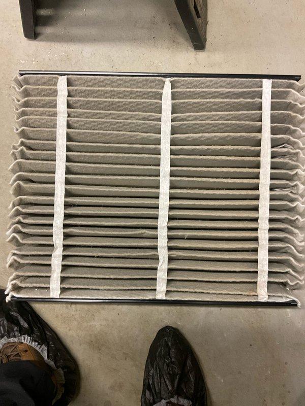 Completed comprehensive BFMA tune-up service on Trane air conditioning system aged 3+ years. Performed standard maintenance protocol including inspection of outdoor condensing unit, verification of refrigerant lines and electrical connections, and replacement of heavily soiled pleated air filter which showed significant dust accumulation. All components operating within normal parameters upon completion of service.