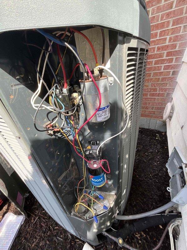 Completed comprehensive BFMA tune-up on 10+ year old outdoor condensing unit as first appointment of the day. Performed full system inspection with access panel removed, examined all internal electrical components including dual run capacitors, compressor connections, and wiring harnesses. Measured compressor amperage draw at 8.46 amps using digital clamp meter to verify proper operating parameters and ensure system is functioning within manufacturer specifications.