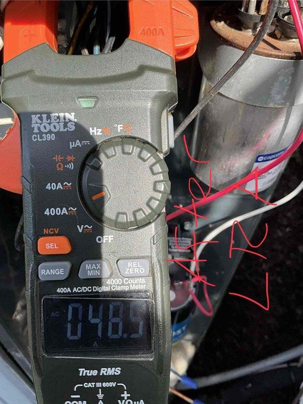 Completed comprehensive BFMA tune-up on 10+ year old outdoor condensing unit as first appointment of the day. Performed full system inspection with access panel removed, examined all internal electrical components including dual run capacitors, compressor connections, and wiring harnesses. Measured compressor amperage draw at 8.46 amps using digital clamp meter to verify proper operating parameters and ensure system is functioning within manufacturer specifications.