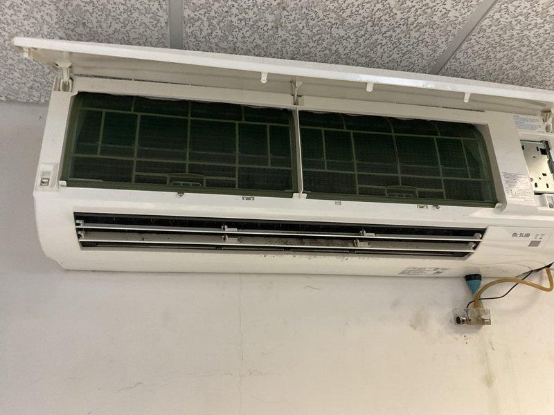 Performed preventative maintenance tune-up on wall-mounted ductless mini-split air conditioning system. Accessed internal components by opening front panel and inspected air filters, which showed normal wear. Cleaned filters and verified proper airflow through evaporator coil and louver operation. Checked electrical connections at junction box and confirmed secure wiring. Tested unit operation, temperature output, and control functions to ensure system performance meets manufacturer specifications.