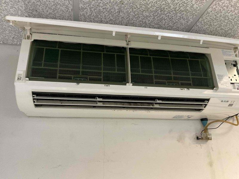 Performed preventative maintenance tune-up on wall-mounted ductless mini-split air conditioning system. Accessed internal components by opening front panel and inspected air filters, which showed normal wear. Cleaned filters and verified proper airflow through evaporator coil and louver operation. Checked electrical connections at junction box and confirmed secure wiring. Tested unit operation, temperature output, and control functions to ensure system performance meets manufacturer specifications.