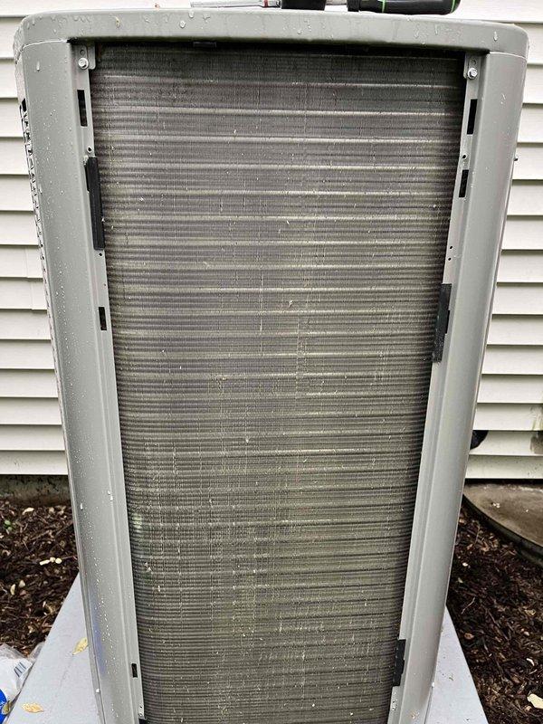 Completed comprehensive BFMA tune-up service on an 8-month-old residential air conditioning system during afternoon appointment window. Performed thorough inspection of outdoor condenser unit, examining heat exchanger coils and fins for proper airflow and debris accumulation. Replaced dirty air filters with new units to restore optimal system efficiency and indoor air quality. Verified all mechanical components operating within manufacturer specifications and documented equipment condition with photographic records.