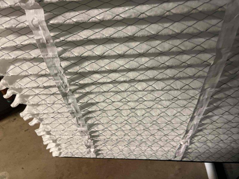 Completed comprehensive BFMA tune-up on 4-year-old air conditioning system, including full system inspection and performance evaluation. Replaced pleated air filter with clean unit to ensure proper airflow and system efficiency. Inspected evaporator coil assembly and noted moderate accumulation of dust and debris on cooling fins; coil showed signs of restricted airflow due to contaminant buildup that will require monitoring during future maintenance intervals.