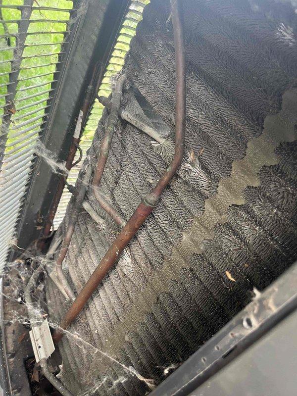 Completed comprehensive BFMA tune-up on 4-year-old air conditioning system, including full system inspection and performance evaluation. Replaced pleated air filter with clean unit to ensure proper airflow and system efficiency. Inspected evaporator coil assembly and noted moderate accumulation of dust and debris on cooling fins; coil showed signs of restricted airflow due to contaminant buildup that will require monitoring during future maintenance intervals.