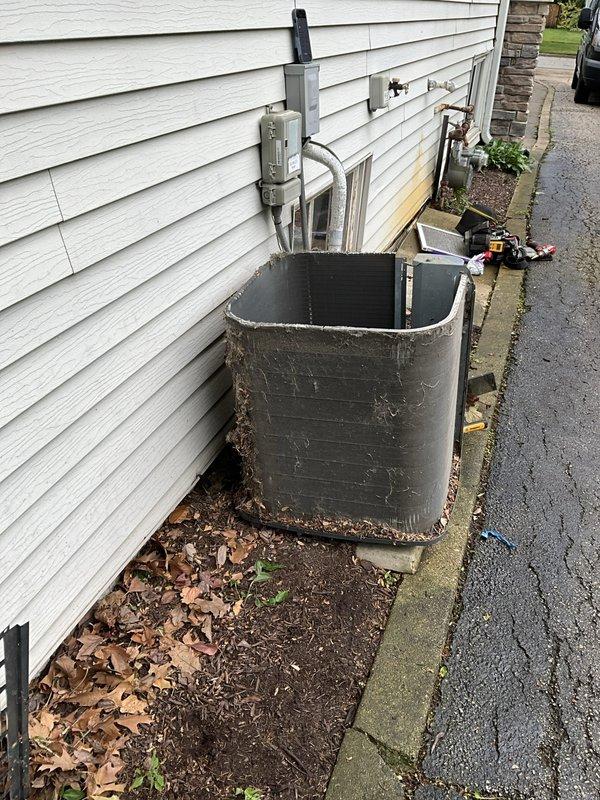Completed comprehensive BFMA tune-up service on 9-year-old residential air conditioning system. Performed full system inspection of outdoor condensing unit, checked refrigerant lines and electrical connections, cleaned condenser coils, verified proper operation of all components, and documented unit condition with photographic evidence. System is operating within normal parameters and ready for continued service.