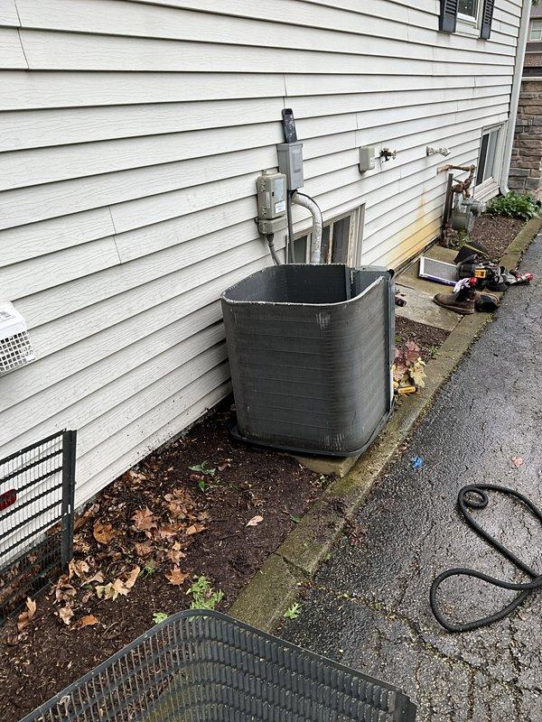 Completed comprehensive BFMA tune-up service on 9-year-old residential air conditioning system. Performed full system inspection of outdoor condensing unit, checked refrigerant lines and electrical connections, cleaned condenser coils, verified proper operation of all components, and documented unit condition with photographic evidence. System is operating within normal parameters and ready for continued service.