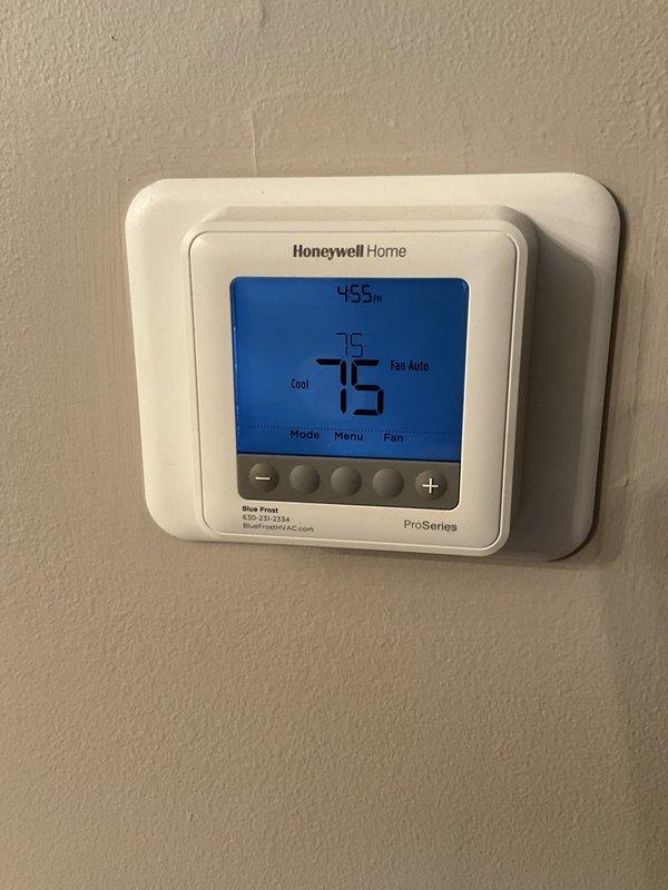 Completed comprehensive BFMA tune-up service on residential Trane air conditioning system. Performed standard maintenance protocol including inspection of outdoor condensing unit, verification of thermostat operation and settings on Honeywell ProSeries programmable unit displaying proper cooling mode and auto fan configuration, and confirmed system functionality. All equipment found operating within normal parameters with no deficiencies noted.