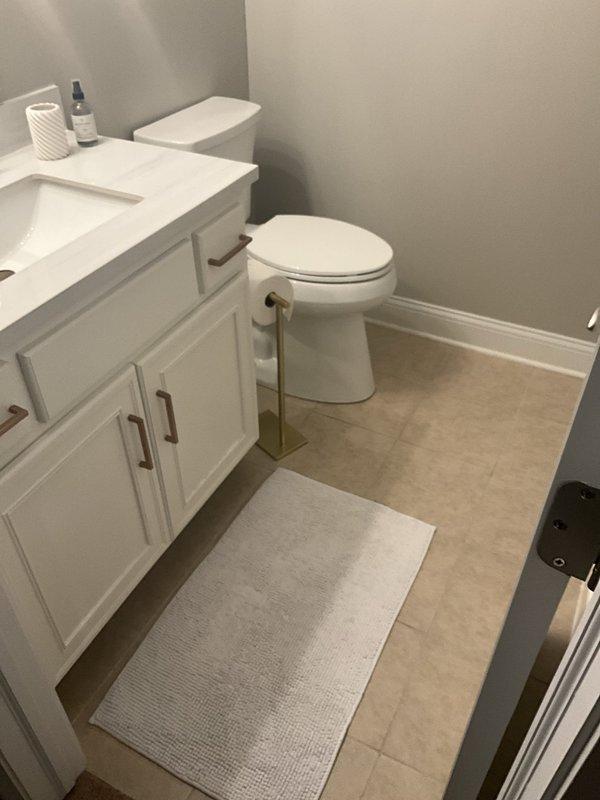 Removed and properly disposed of existing toilet fixture. Assembled and installed customer-supplied two-piece porcelain toilet in residential bathroom, ensuring proper alignment and secure mounting to floor flange. Verified flush mechanism operation and checked for leaks at all connection points. Installation includes one-year labor warranty; no manufacturer warranty provided on customer-supplied fixture.