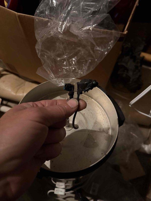 Responded to no-cooling complaint and performed diagnostic evaluation of air conditioning system. Upon inspection, discovered failed capacitor with visible burn damage and deterioration. Found significant corrosion and rust on electrical panel components and mounting brackets, indicating prolonged moisture exposure. Replaced defective capacitor and verified proper electrical connections throughout control box. System restored to normal operation with proper cooling functionality confirmed.