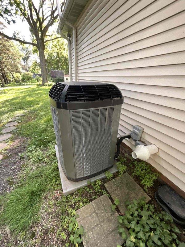 Completed comprehensive BFMA tune-up on residential HVAC system with equipment over 5 years old. Performed full inspection and maintenance of outdoor air conditioning unit including condenser coil cleaning, refrigerant pressure check, electrical connection testing, and capacitor evaluation. Inspected indoor furnace system in basement mechanical room, verified proper airflow through ductwork, examined heat exchanger, tested thermostat operation, and ensured all safety controls functioning correctly. System operating within manufacturer specifications upon completion, with all components cleaned, lubricated, and adjusted for optimal performance.