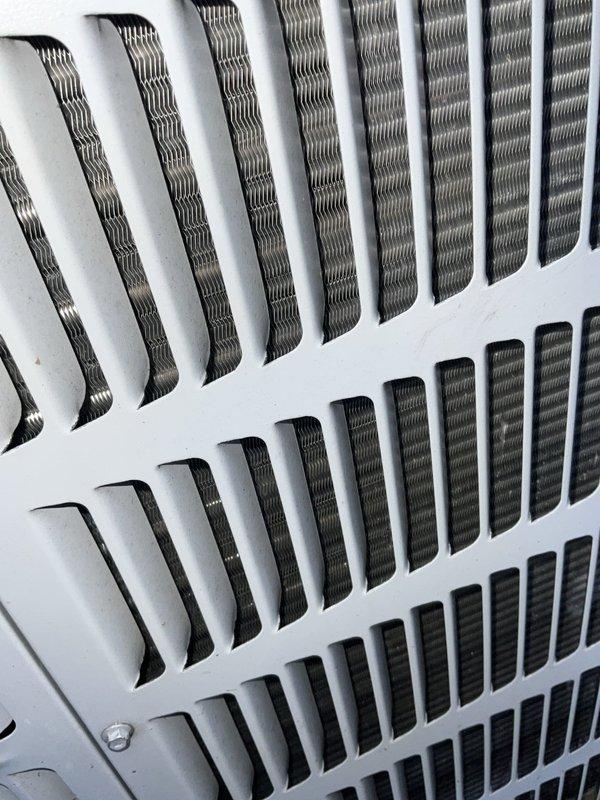 Completed comprehensive BFMA tune-up service on an 8-year-old outdoor air conditioning unit. Performed standard maintenance procedures including inspection of condenser coil fins, verification of proper airflow through heat exchanger components, and assessment of overall system operation. Unit found in satisfactory working condition with all components functioning within normal parameters.
