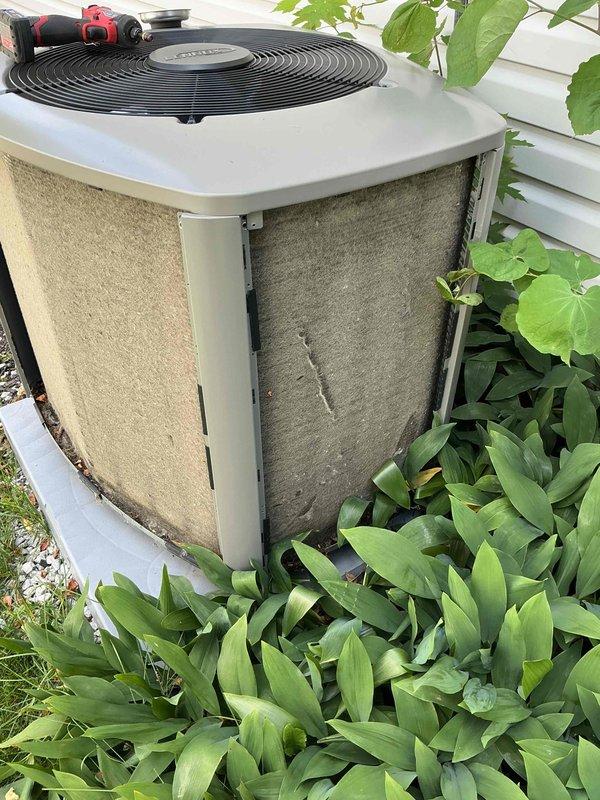 Performed comprehensive BFMA tune-up on residential air conditioning system including full inspection of outdoor condenser unit. Replaced dual-run capacitor with new SUREPHON unit rated at 370V AC/440V AC to ensure proper compressor and fan motor operation. Cleaned condenser cabinet exterior, removing accumulated dirt and environmental staining from panels, and cleared vegetation growth from around unit to maintain proper airflow and accessibility for future service.