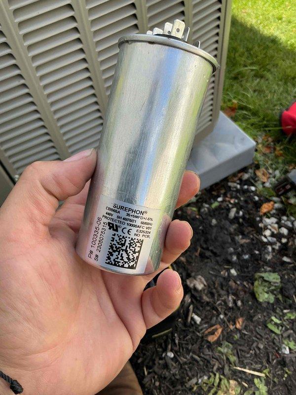Performed comprehensive BFMA tune-up on residential air conditioning system including full inspection of outdoor condenser unit. Replaced dual-run capacitor with new SUREPHON unit rated at 370V AC/440V AC to ensure proper compressor and fan motor operation. Cleaned condenser cabinet exterior, removing accumulated dirt and environmental staining from panels, and cleared vegetation growth from around unit to maintain proper airflow and accessibility for future service.