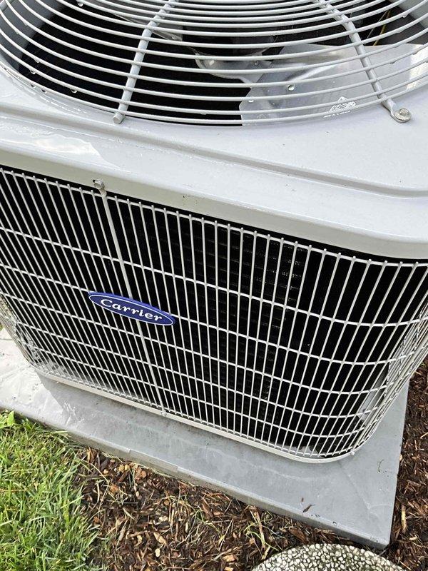 # HVAC Maintenance Summary

Completed comprehensive BFMA tune-up service on a 2-year-old Carrier air conditioning system, including AC performance evaluation, air filter replacement, and semi-annual electronic air cleaner (EAC) maintenance. 

# Detailed Work Performed

**Air Handler Inspection and Maintenance:**
Accessed interior air handler unit and performed thorough visual inspection of all accessible components. Observed significant corrosion and oxidation on copper refrigerant lines despite the relatively young age of the equipment, indicating potential moisture intrusion or environmental factors accelerating deterioration. Removed accumulated debris, dust, and organic matter from the air handler cabinet base to prevent airflow restrictions and maintain proper system hygiene. Inspected evaporator coil fins, which appeared in satisfactory condition with adequate spacing for proper heat exchange. Verified all electrical connections were secure, including low-voltage wiring. Noted th