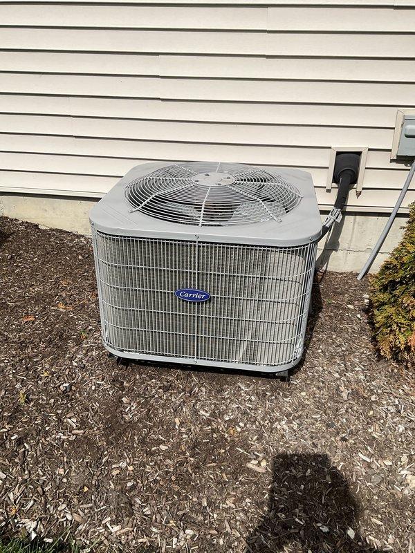 Completed comprehensive BFMA tune-up service on 4+ year old Carrier outdoor condensing unit. Performed standard maintenance protocol including inspection of condenser coils, fan motor operation, electrical connections at disconnect box, and refrigerant levels. Unit operating within normal parameters upon completion of service.