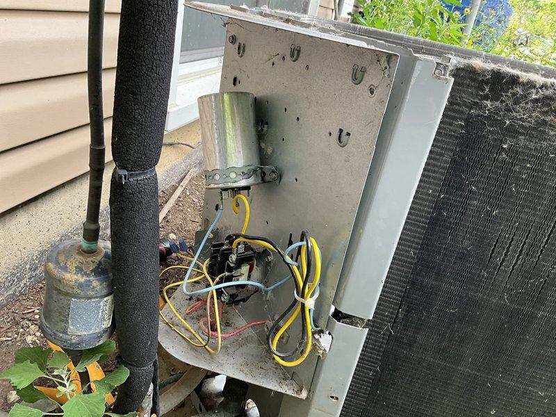 Completed comprehensive BFMA tune-up on 16+ year old residential air conditioning system. Performed full system inspection including blower assembly evaluation, verified proper operation of centrifugal fan wheel and motor shaft assembly, inspected electrical disconnect box and contactor components, checked refrigerant line insulation integrity, and assessed outdoor condensing unit coil condition. All components were found operational with normal wear consistent with equipment age, and system was left in proper working order.