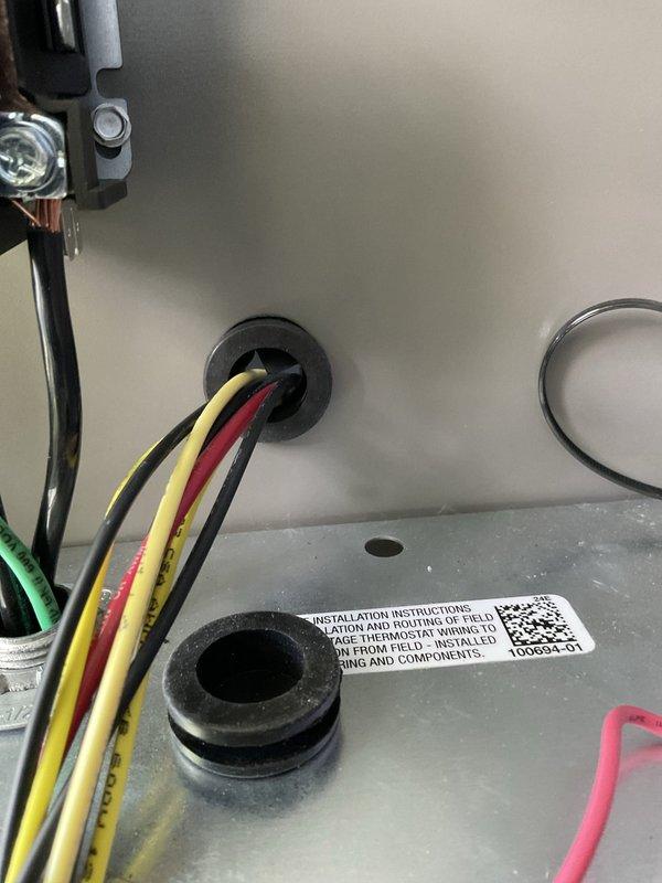 Installed critter kit protection system on outdoor HVAC unit to prevent pest intrusion and damage to electrical components. Added rubber grommets through access panel penetrations to seal wire entry points, protecting internal wiring, control circuits, and refrigerant lines from rodent and insect access.
