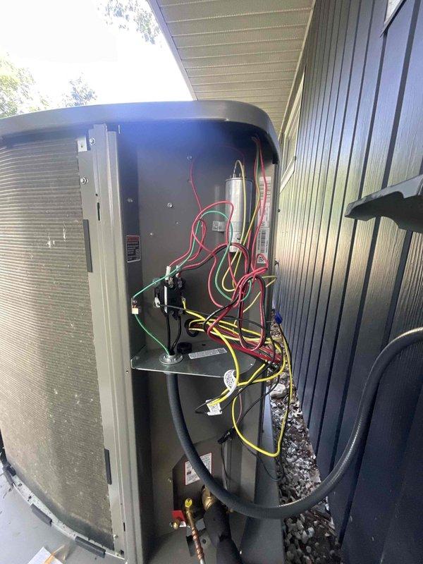 Installed critter kit protection system on outdoor HVAC unit to prevent pest intrusion and damage to electrical components. Added rubber grommets through access panel penetrations to seal wire entry points, protecting internal wiring, control circuits, and refrigerant lines from rodent and insect access.