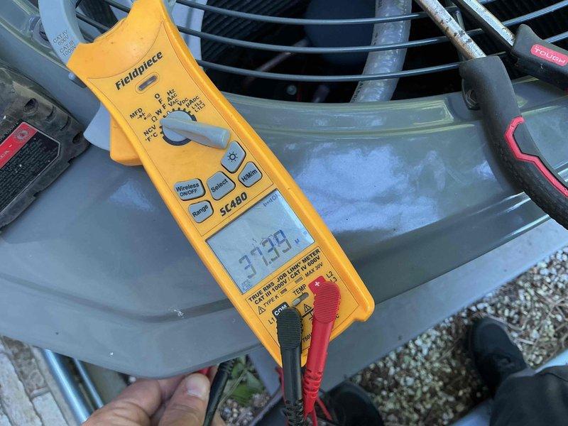 Completed comprehensive BFMA tune-up service on residential air conditioning system. Performed electrical diagnostics on outdoor condenser unit, measuring amperage draw at 37.93 amps using clamp meter to verify compressor and fan motor performance within manufacturer specifications. Inspected condenser fan motor and protective grille for proper operation. Verified ecobee smart thermostat programming and reviewed system maintenance reminders to ensure proper scheduling of future service intervals. All components operating normally with no deficiencies noted during inspection.